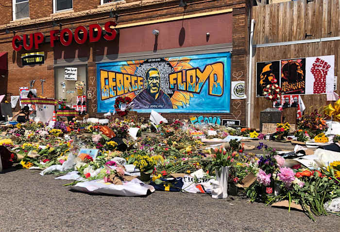 A memorial for George Floyd outside of Cup Foods